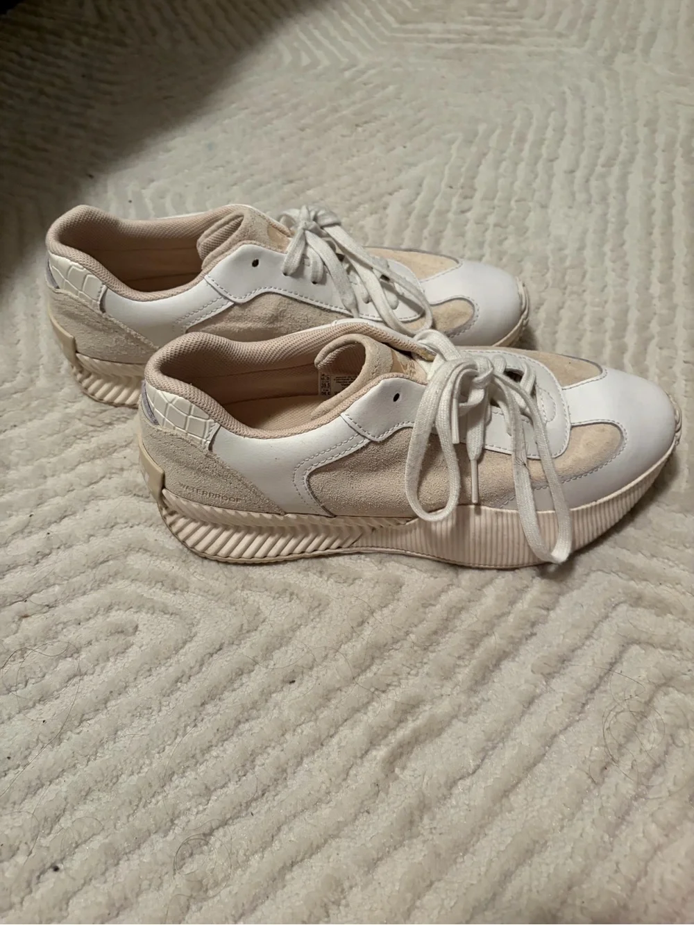 Women’s Sorel waterproof Lace-Up Sneakers in Cream and White
